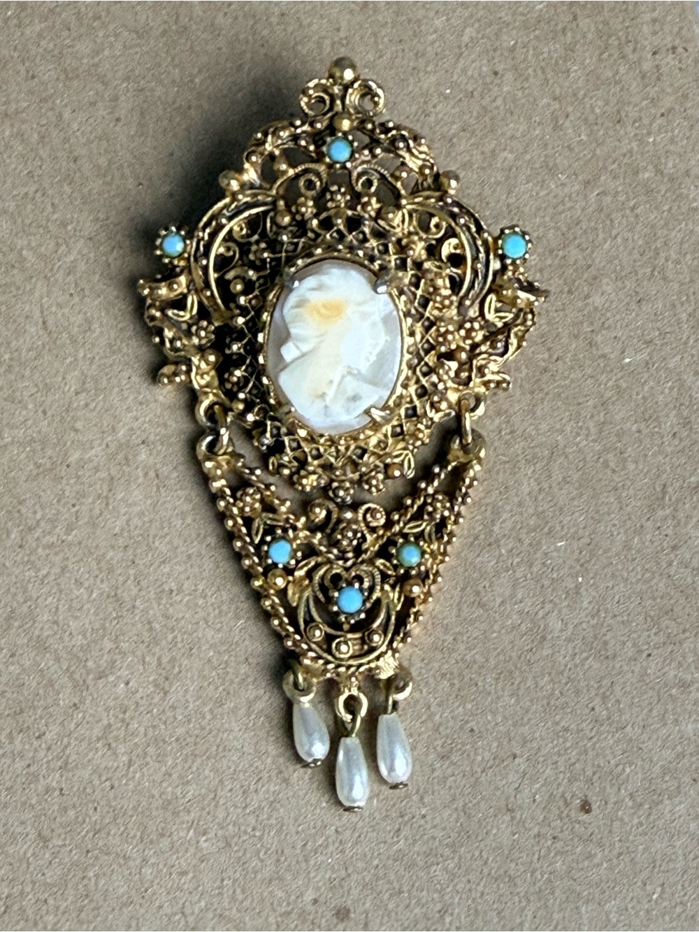 Victorian-Style Gold Cameo Brooch with Turquoise Accents